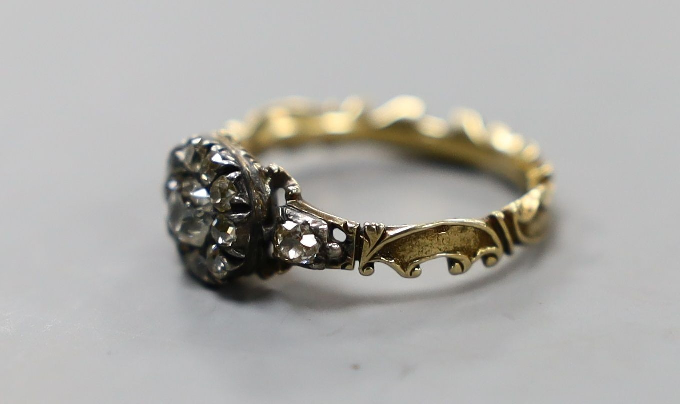 A late 18th century gold and old cut diamond set circular cluster ring